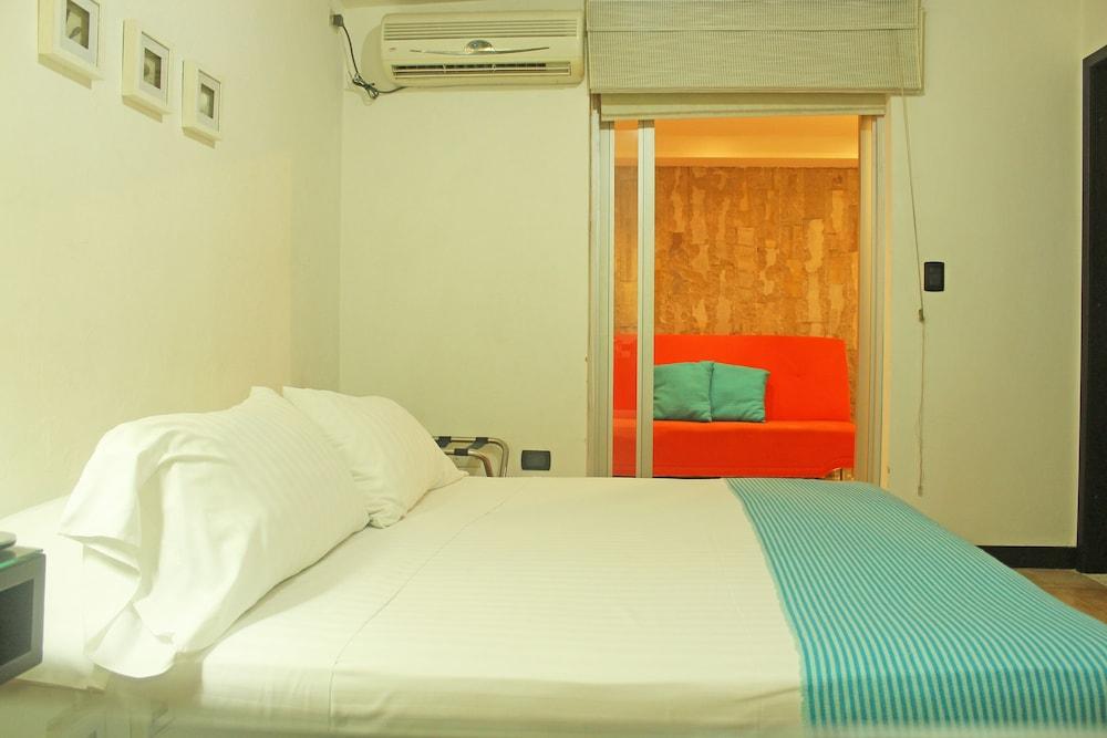 Hotel Santorini Express Y Cabanas Санта-Марта Экстерьер фото