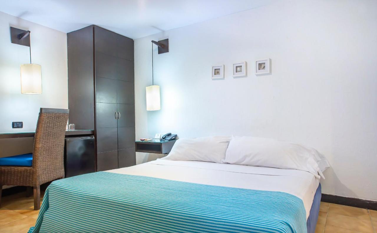 Hotel Santorini Express Y Cabanas Санта-Марта Экстерьер фото