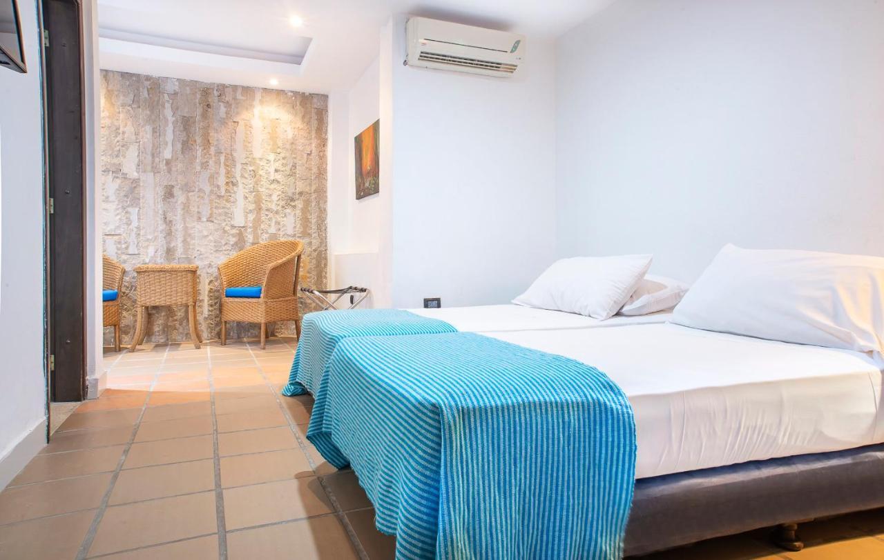 Hotel Santorini Express Y Cabanas Санта-Марта Экстерьер фото