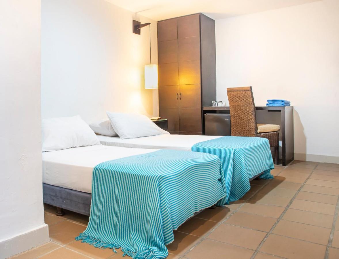Hotel Santorini Express Y Cabanas Санта-Марта Экстерьер фото