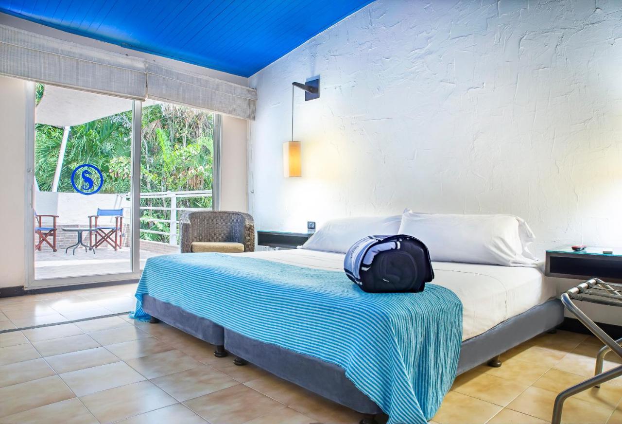 Hotel Santorini Express Y Cabanas Санта-Марта Экстерьер фото